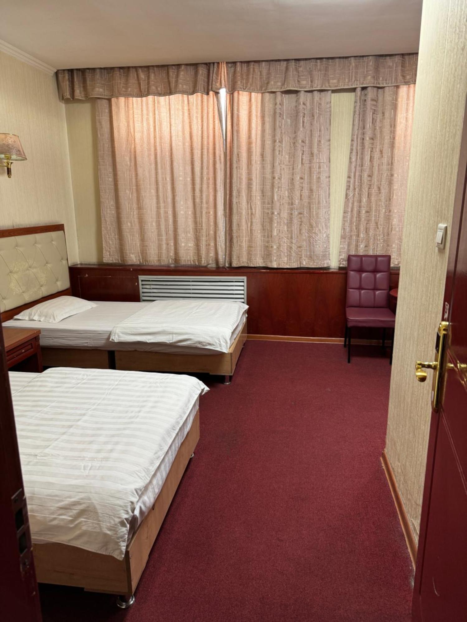 אלמטי Zolotoi Drakon Hotel מראה חיצוני תמונה
