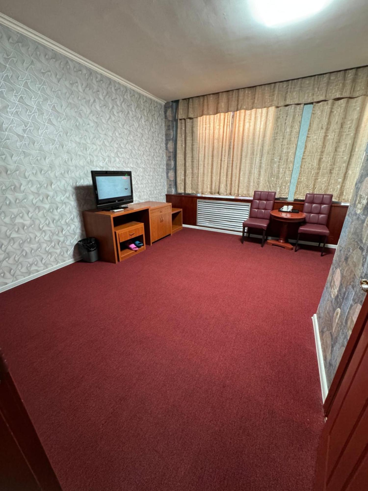 אלמטי Zolotoi Drakon Hotel מראה חיצוני תמונה