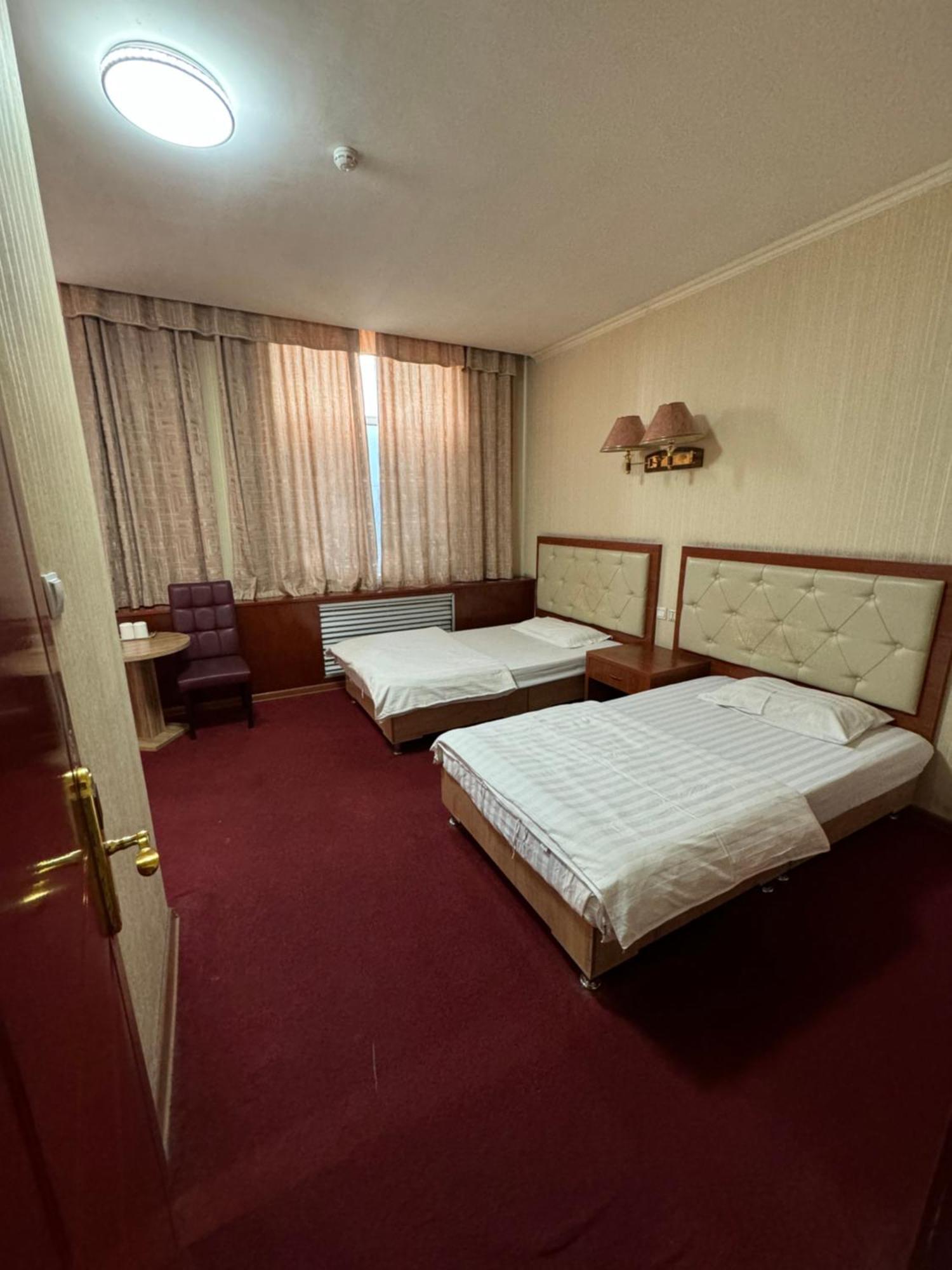 אלמטי Zolotoi Drakon Hotel מראה חיצוני תמונה