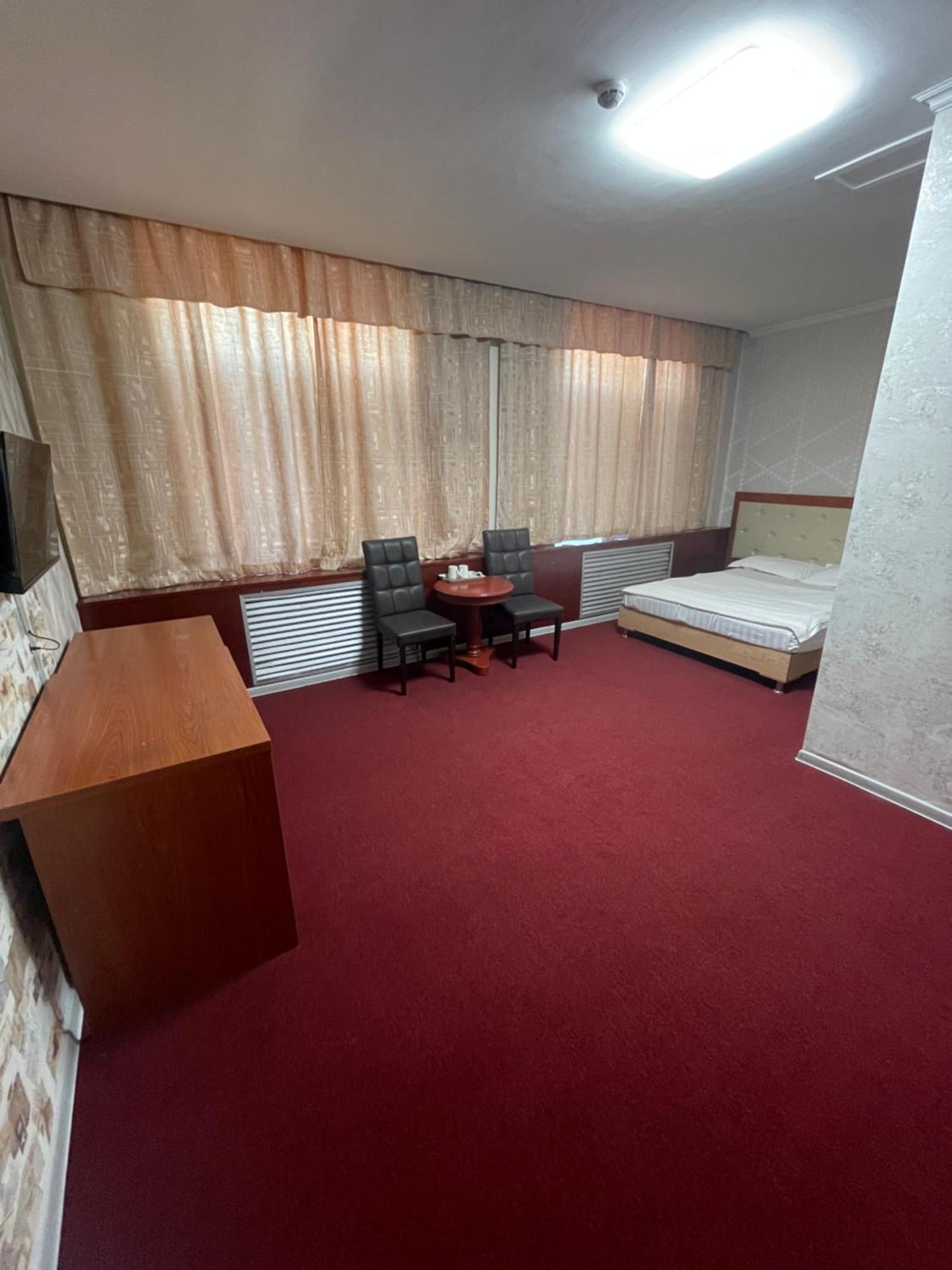 אלמטי Zolotoi Drakon Hotel מראה חיצוני תמונה