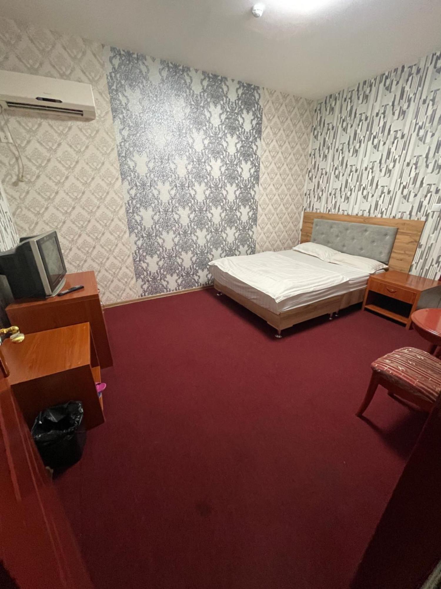 אלמטי Zolotoi Drakon Hotel מראה חיצוני תמונה