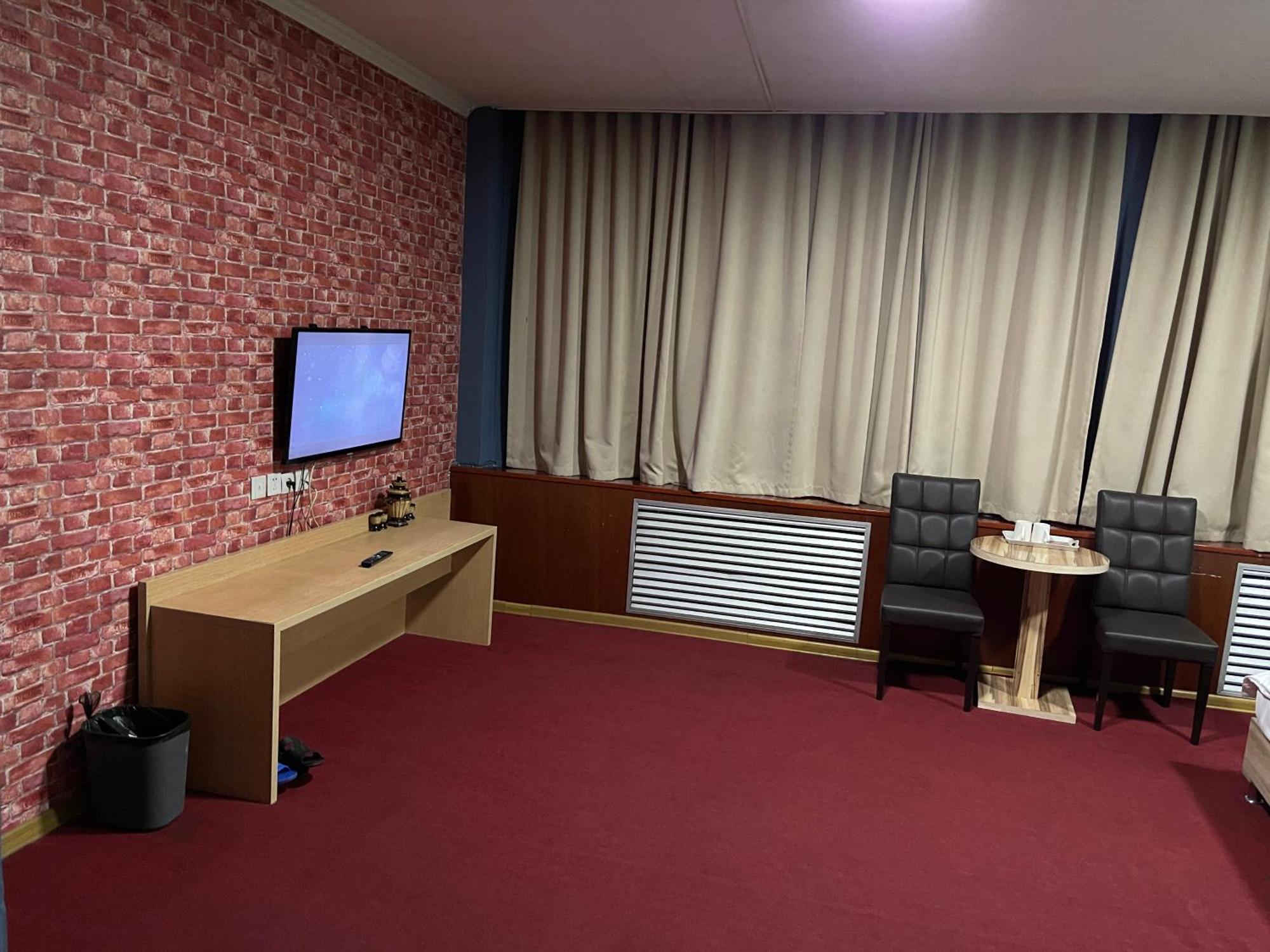 אלמטי Zolotoi Drakon Hotel מראה חיצוני תמונה